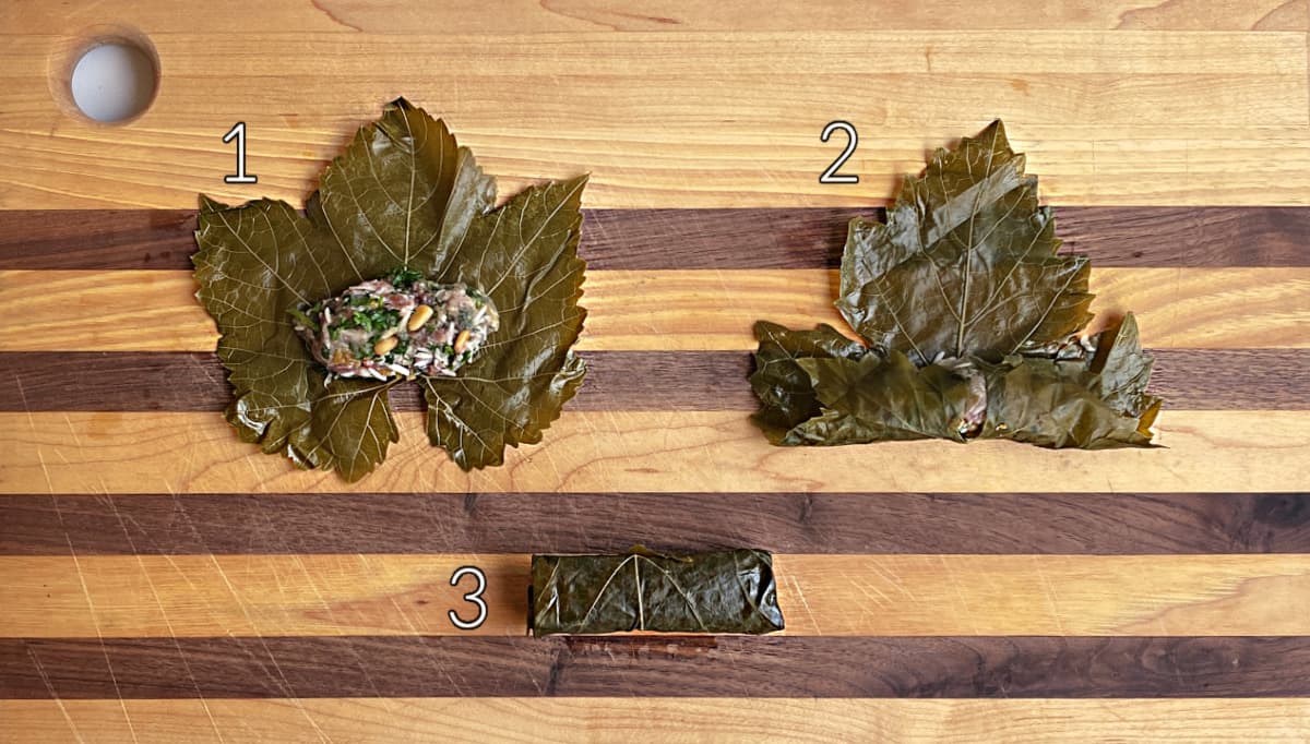 3 shots of grape leaves (1) with a small amount of filling int he center, (2) leaf bottom rolled up and over the filling, and (3) rolled grape leaf.