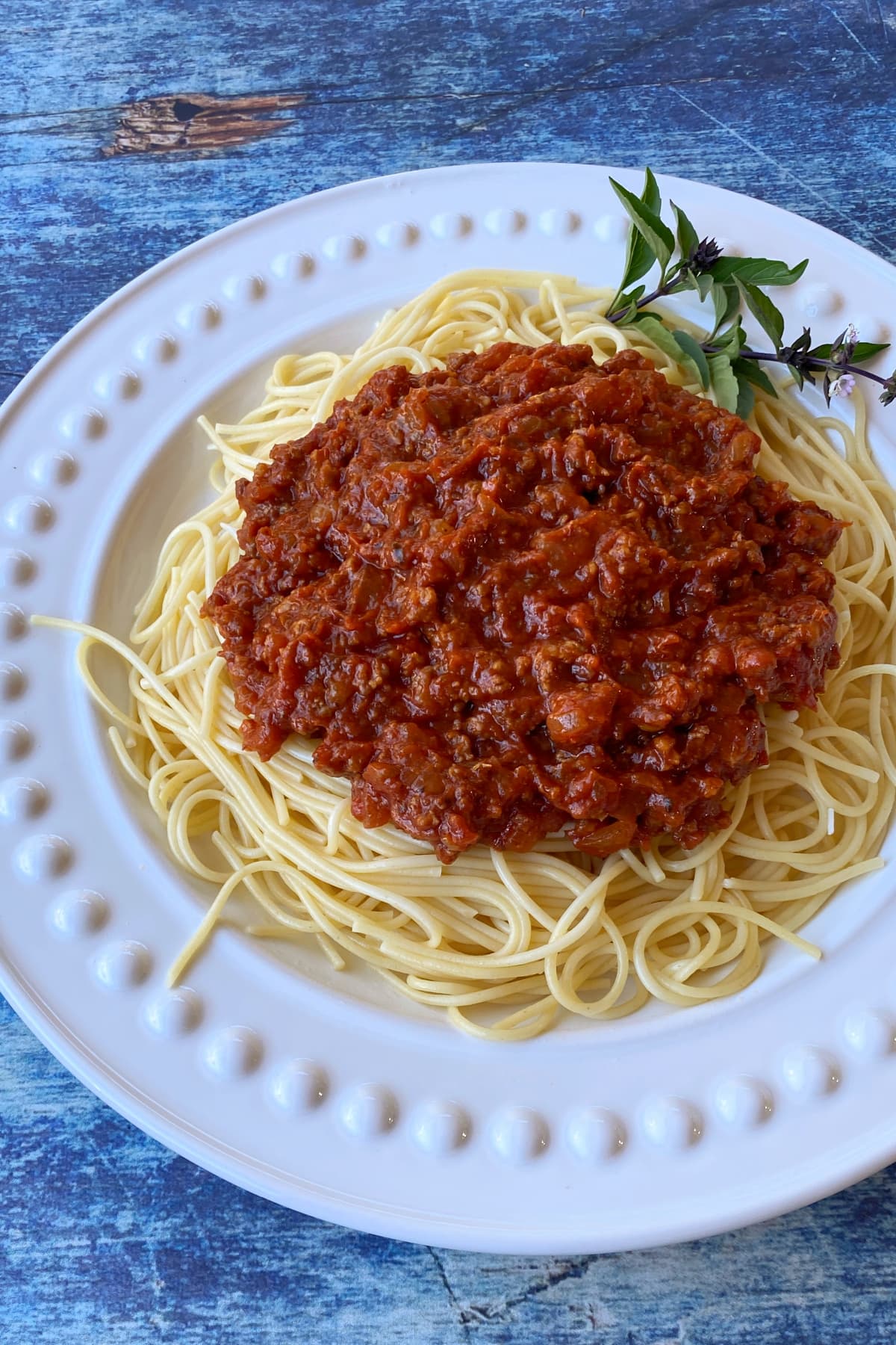 Classic American Spaghetti Sacue with meat, over thin spaghetti noodles.