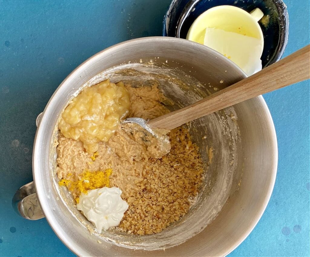 Mixing bowl with wet and dry ingredients, unmixed.