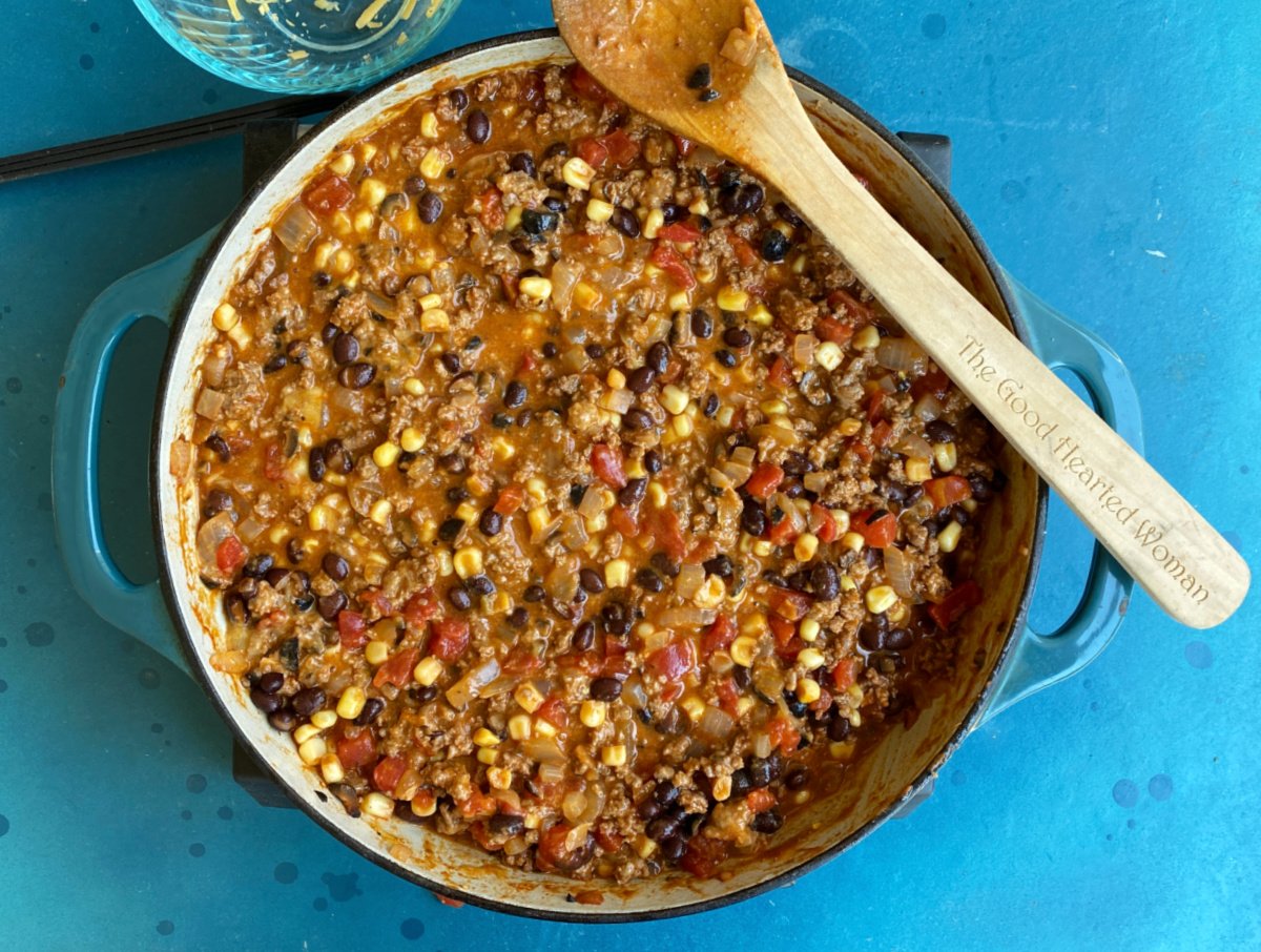 Tamale pie filling all mixed together in large enameled skillet. 