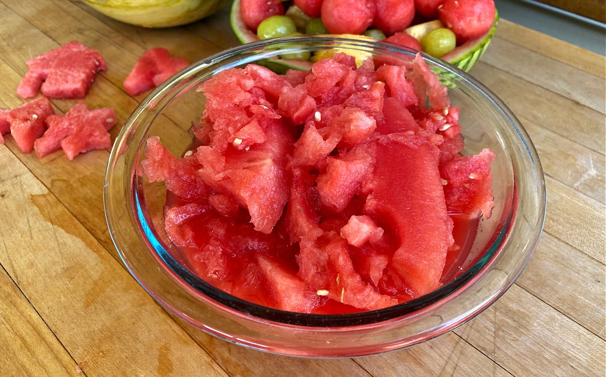 Watermelon pieces in a glass bowl.