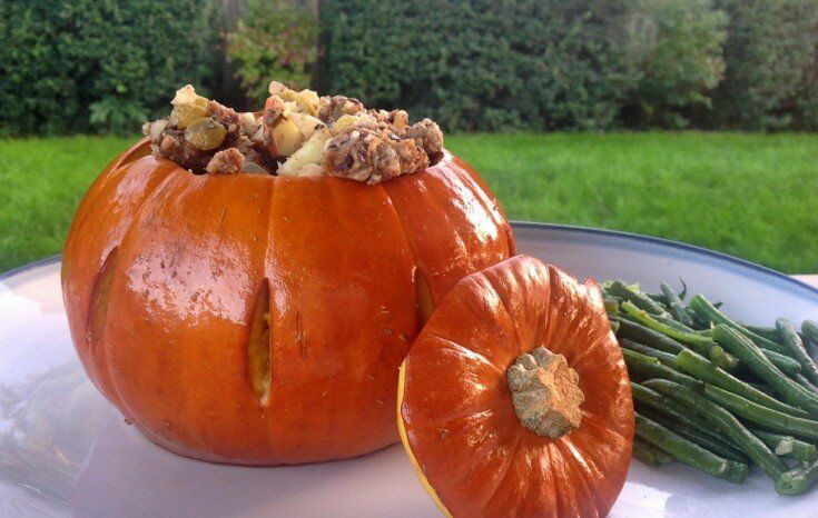 Roasted Stuffed Pumpkin on plate with green beans