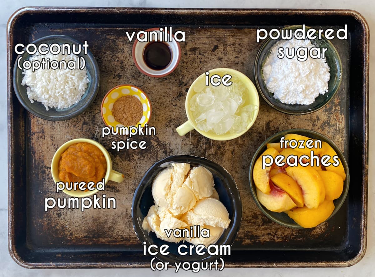 Photo of individual ingredients that go into this Pumpkin Smoothie recipe, measured and prepped.