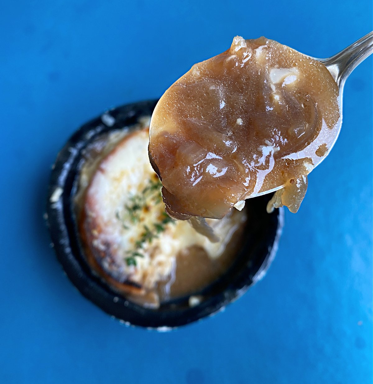 Spoonful of French Onion Soup.