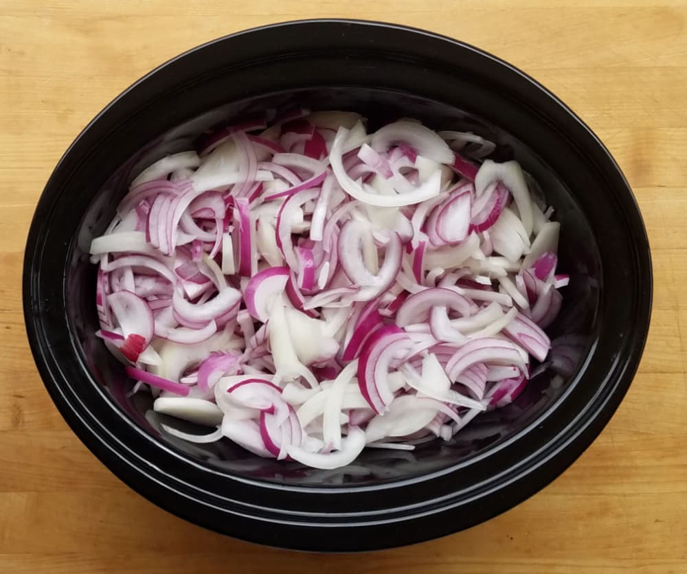 Sliced onions in slow cooker