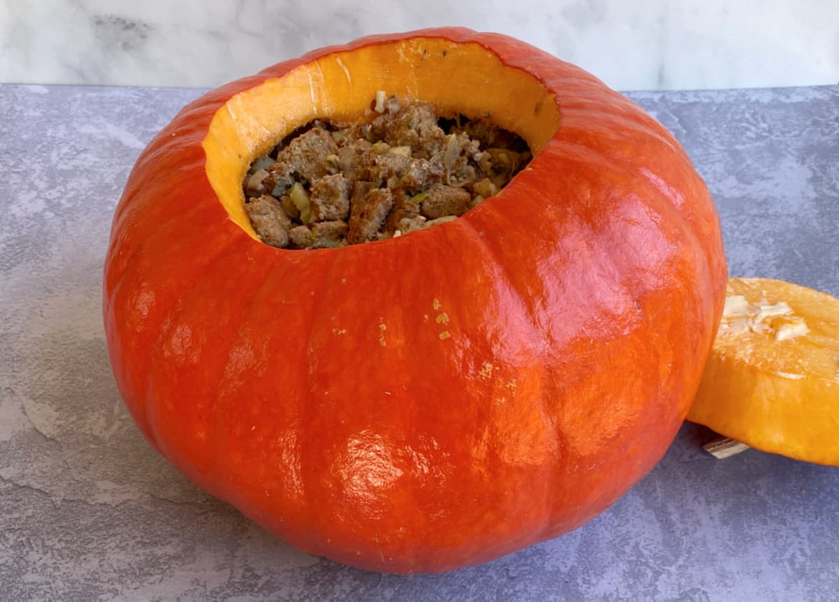 Stuffing added to hollowed out pumpkin.