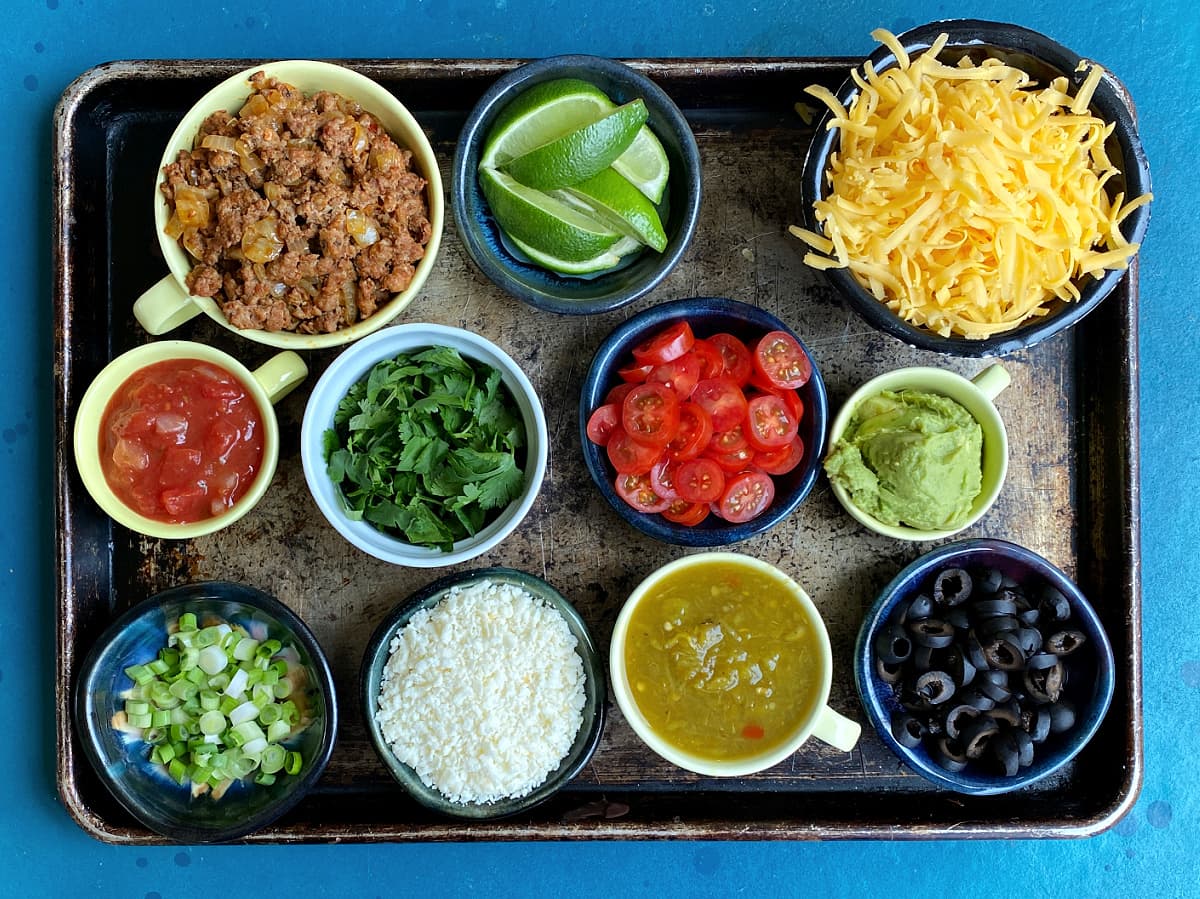 Toppings for Huevos Rancheros: shredded cheddar cheese grated cotija sliced olives sliced jalapenos sliced avocados sour cream guacamole salsa chopped cilantro cooked chorizo 