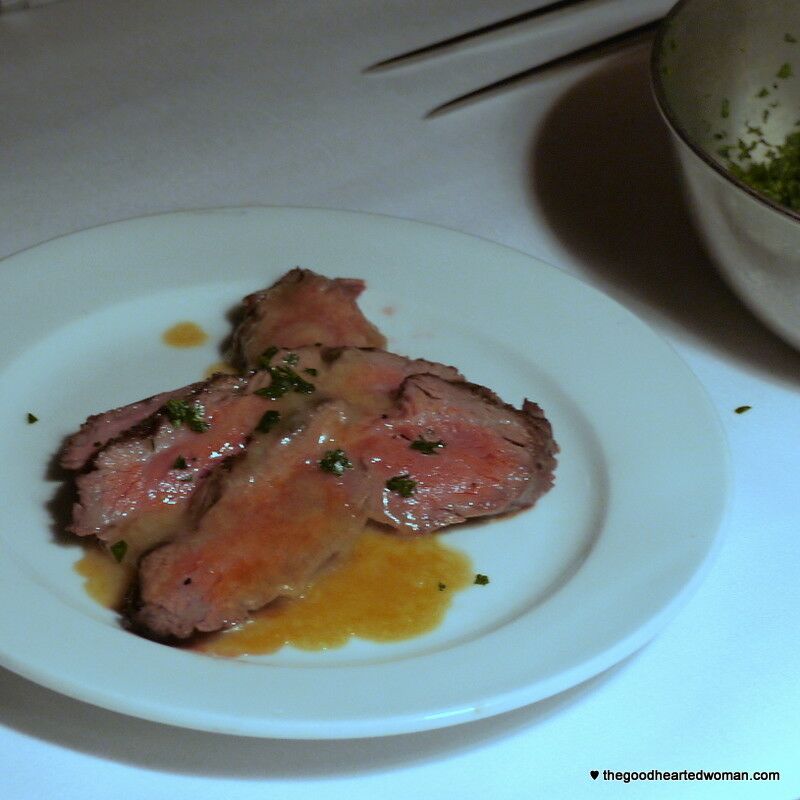 Plate of sliced steak. 