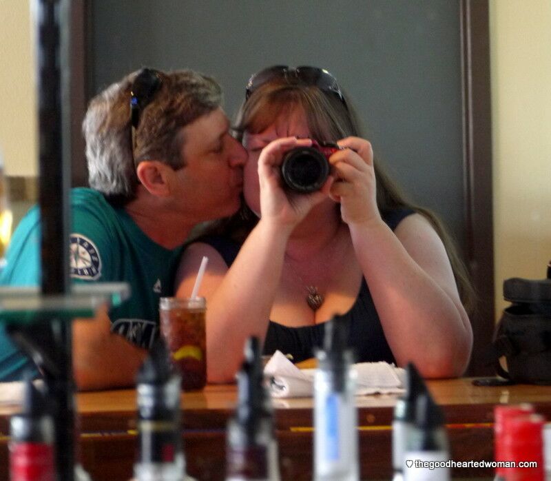 Me taking a picture into the mirror behind the HQ bar. Mr B is kissing my cheek. 