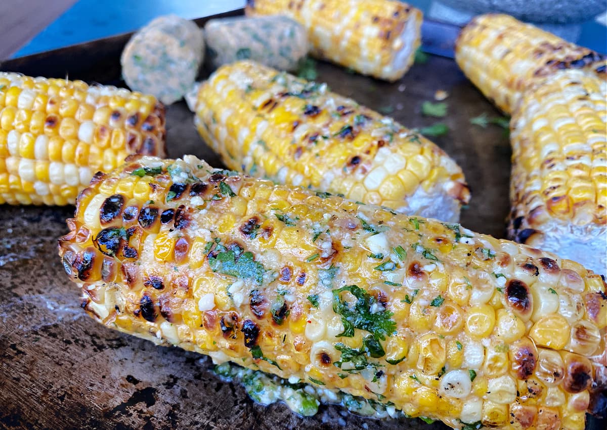 Close-up of Mexican Street Corn (Elotes) on a sheet pan