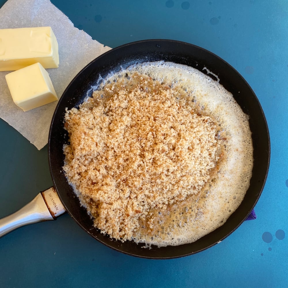butter and crumbs in skillet