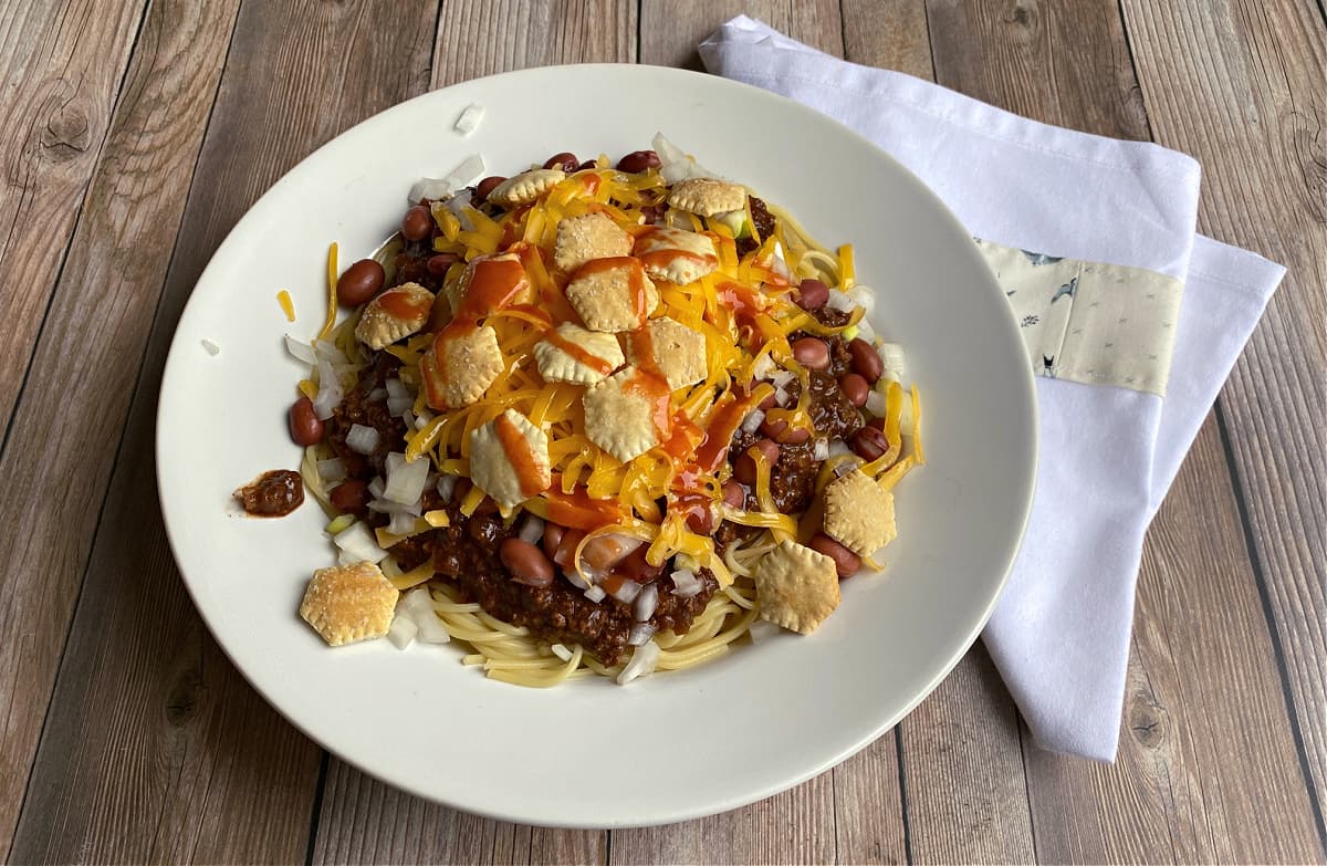 5-Way Cincinnati chili with spaghetti, chili, cheese, onions, oyster crackers and Franks. 