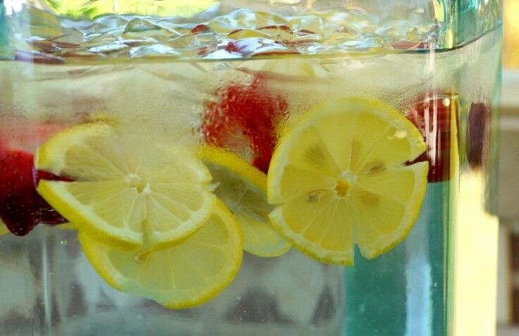 Close-up of lemonade in a glass pitcher. 