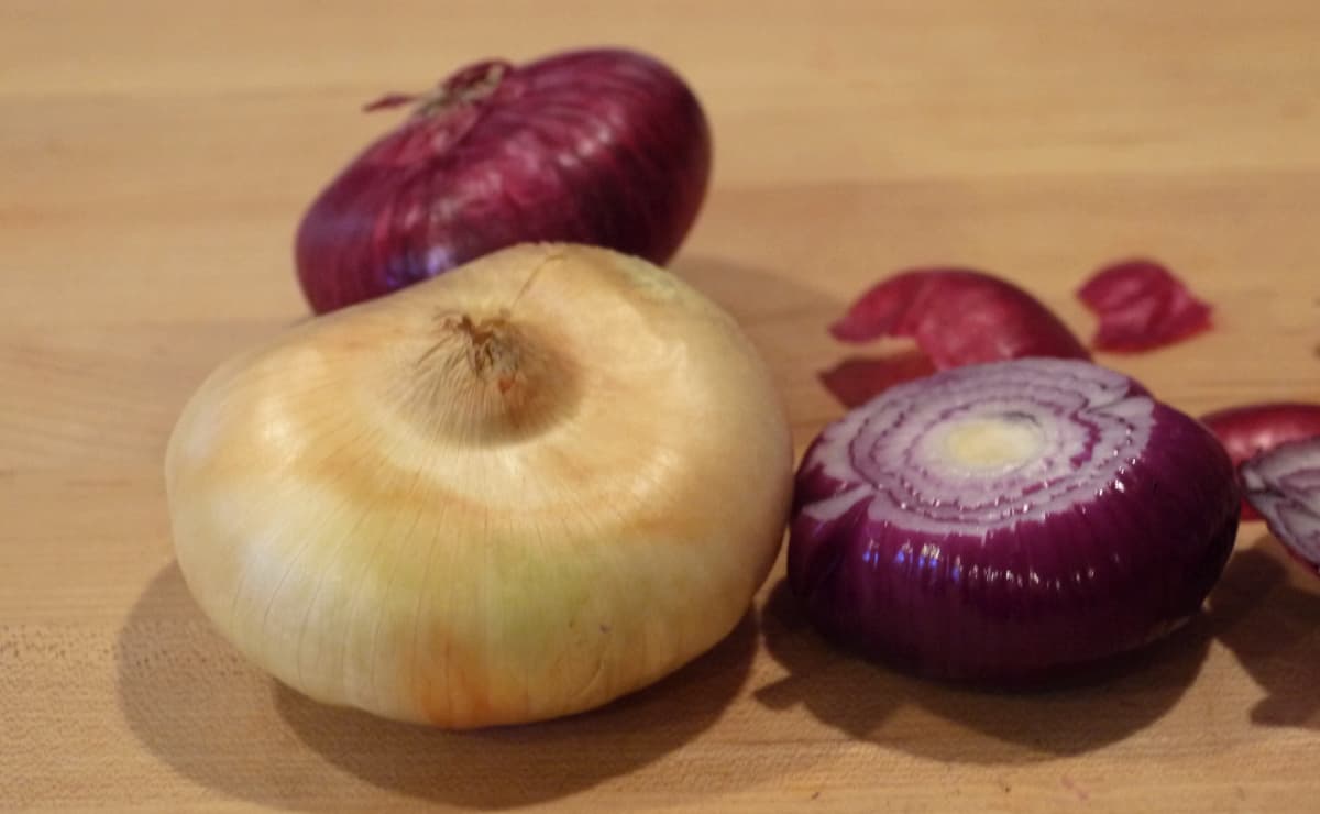 Purple and yellow cipollini onions.