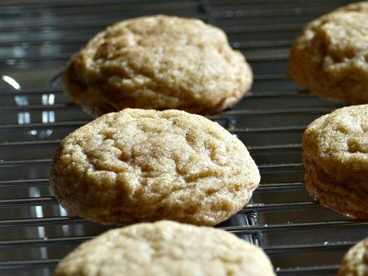 Closeup of cookies cooling on a wire rack.