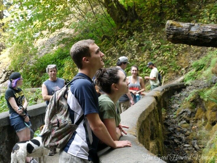 Young couple looking at the falls. 