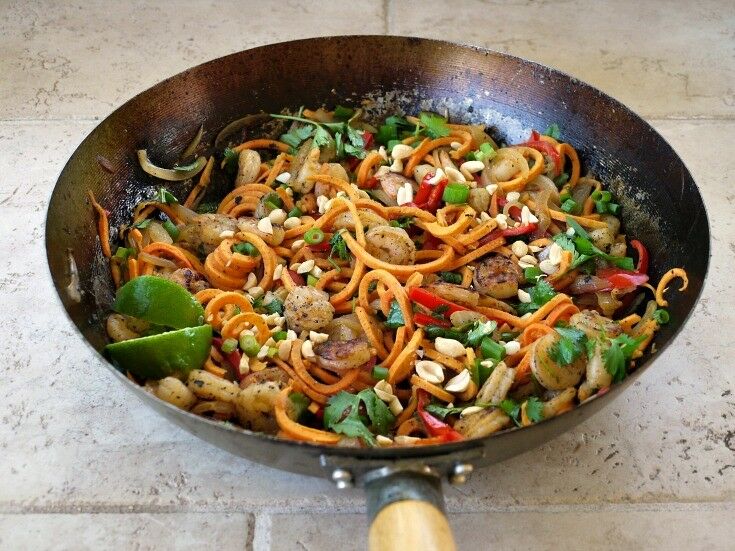 Spiralized Sweet Potato Pad Thai, cooked in wok. 