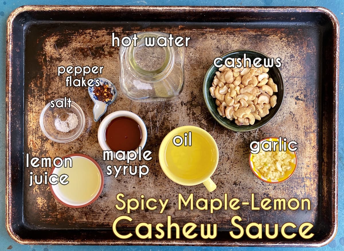 Cashew sauce ingredients, labeled: hot water, cashews, oil, garlic, maple syrup, pepper flakes, salt, lemon juice.