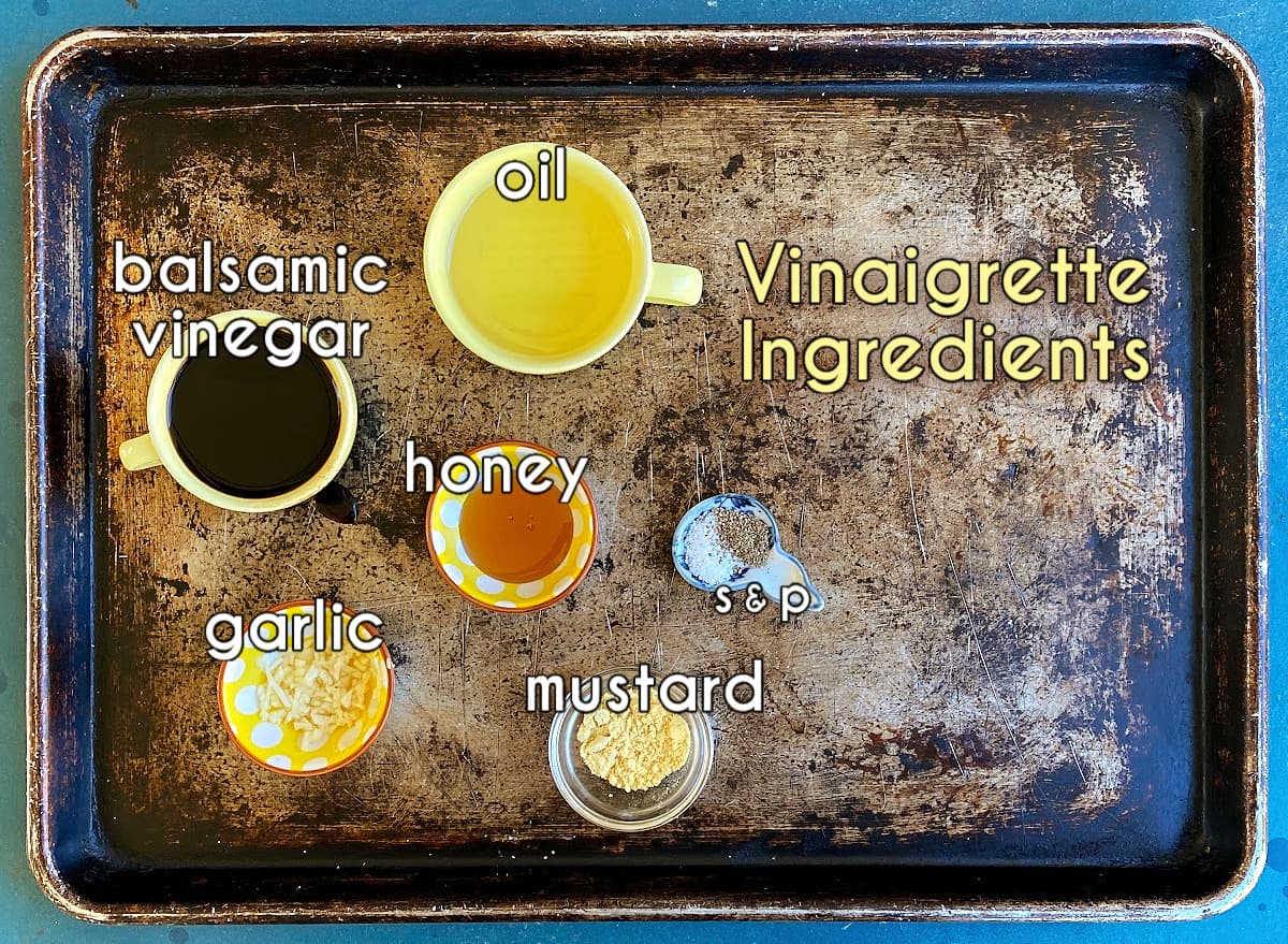 Balsamic vinaigrette ingredients, labeled: vinegar, oil, dry mustard, honey, garlic, salt & pepper.