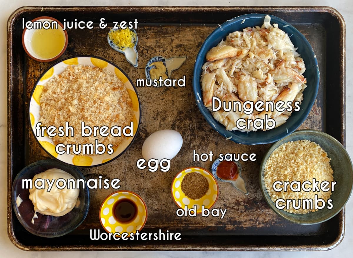 Crab Cakes ingredients, labeled: crab, bread crumbs, cracker crumbs, egg, seasonings.