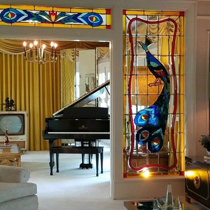 Interior view of Graceland's glass peacock; sitting room piano. 