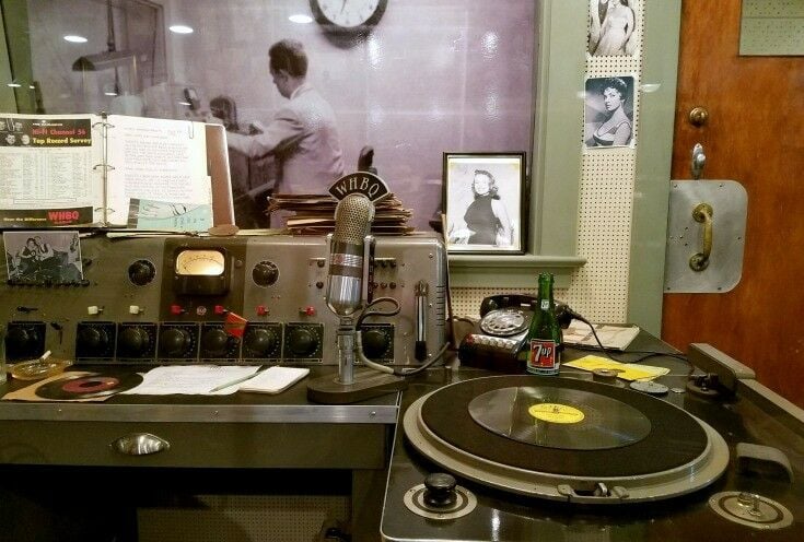 Old fashioned radio turntable, large radio microphone, control panel for old radio station. 