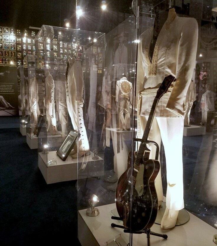 Row of white jumpsuits at the Elvis the Entertainer Career Museum