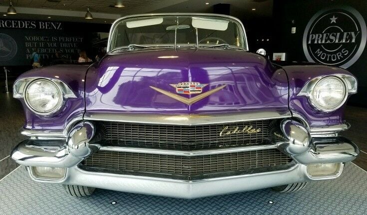 Front end of a 1956 purple Cadillac - Presley Motors Automobile Exhibit