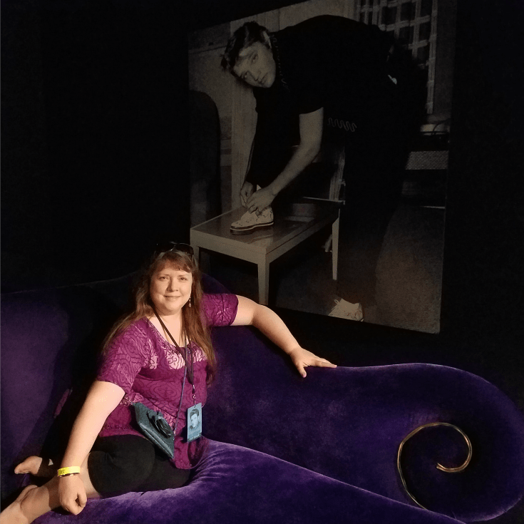 Me on a purple velvet lounge at the Elvis Presley's Memphis Entertainment Complex | The Good Hearted Woman 