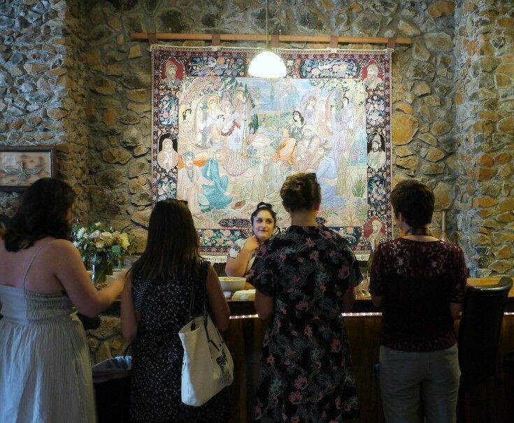 Tasting Room Interior with Persian tapestry on wall