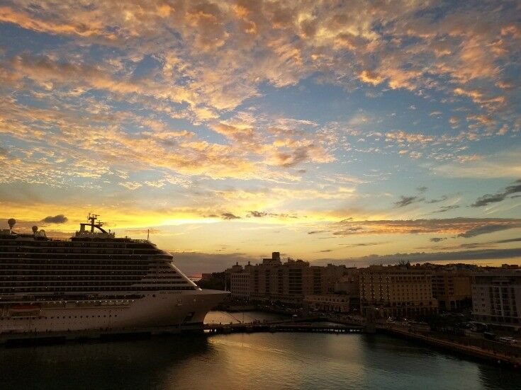 Cruise ship in the sunset San Juan harbor. 