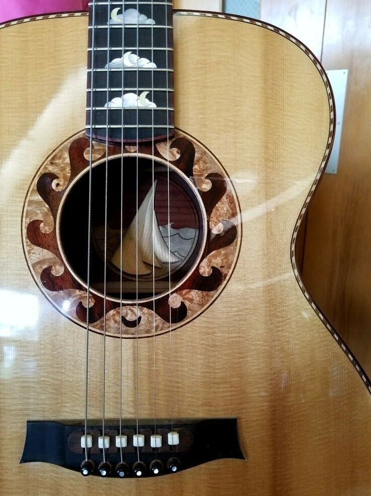 Closeup of the stunning "sailing under the moon" guitar by Jay Dickinson 