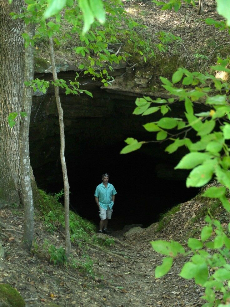 Cave Spring - Rick standing at cave entrance.