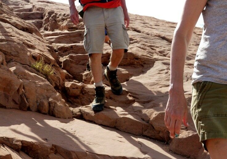 Grippy sandstone is relatively easy to walk on. Wear solid, supportive shoes with good traction.
