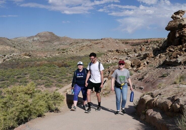 My Cheerleaders! Three twenty-somethings walking toward me on the path.