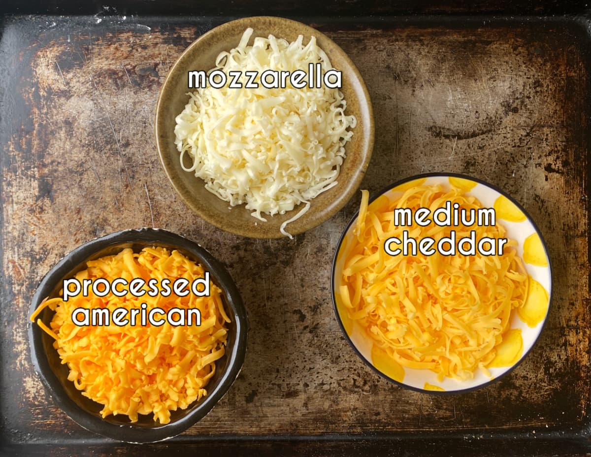 Photo of individual ingredients that go into the copycat government cheese portion of this school pizza recipe, measured and prepped.