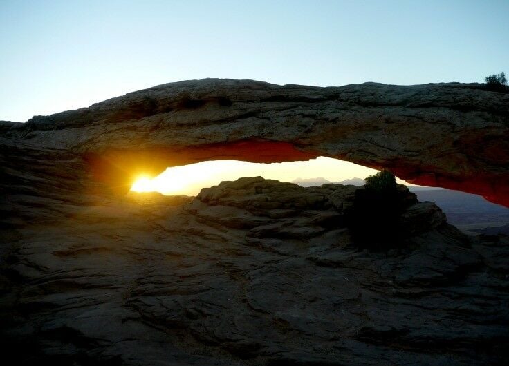 Sun peeking through Mesa Arch.