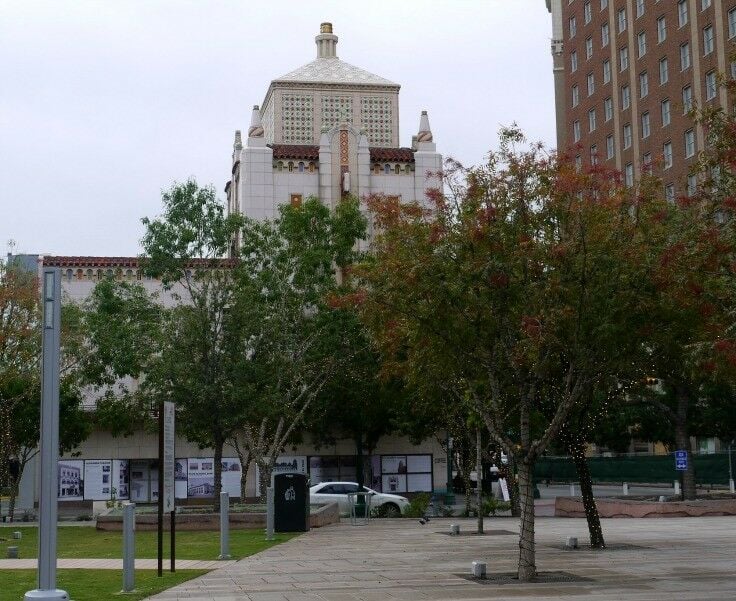 Trees lining walkway in San Jacinto Plaza