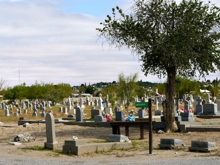 The Mormon section of the cemetery, marked by a green street sign. 