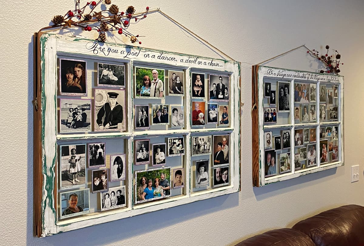 Two old window frames hung on wall next to one another; panels filled with matted photos, mostly vintage prints.