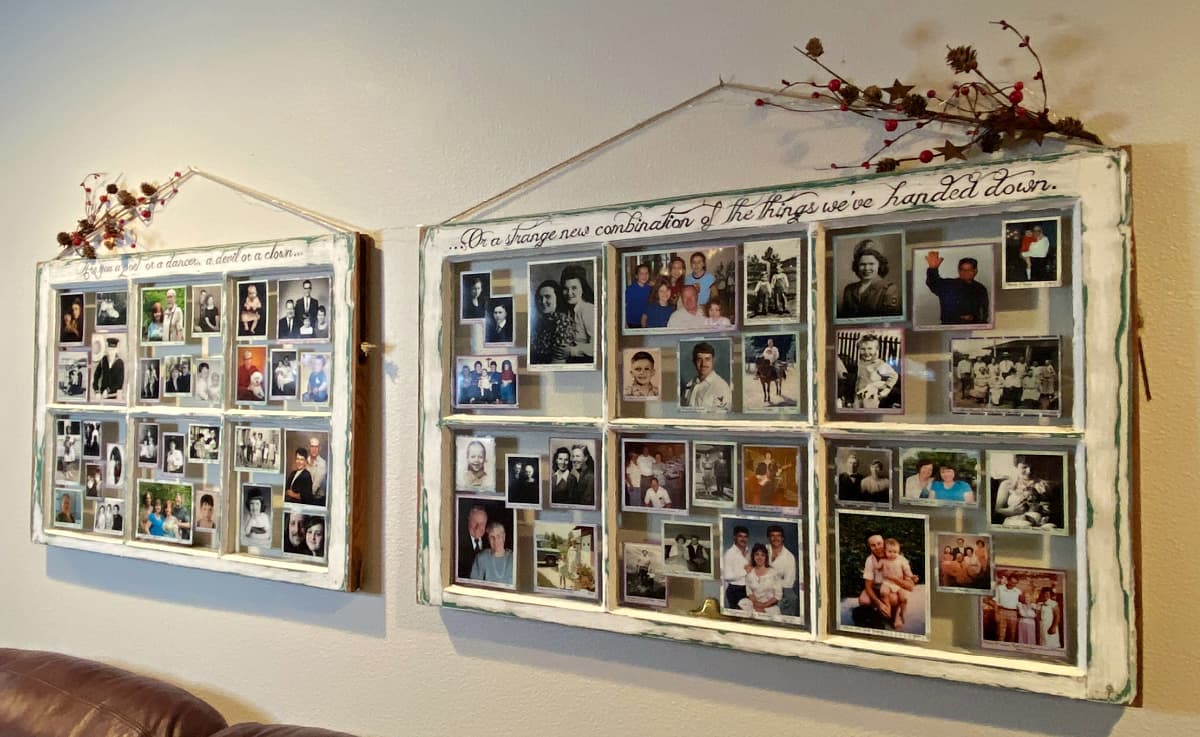 Angle shot of two window frames filled with small photos of people.