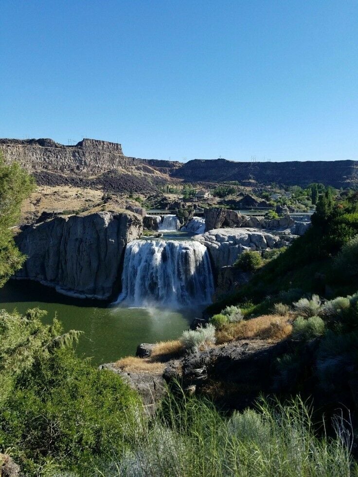 Long shot of waterfall. 