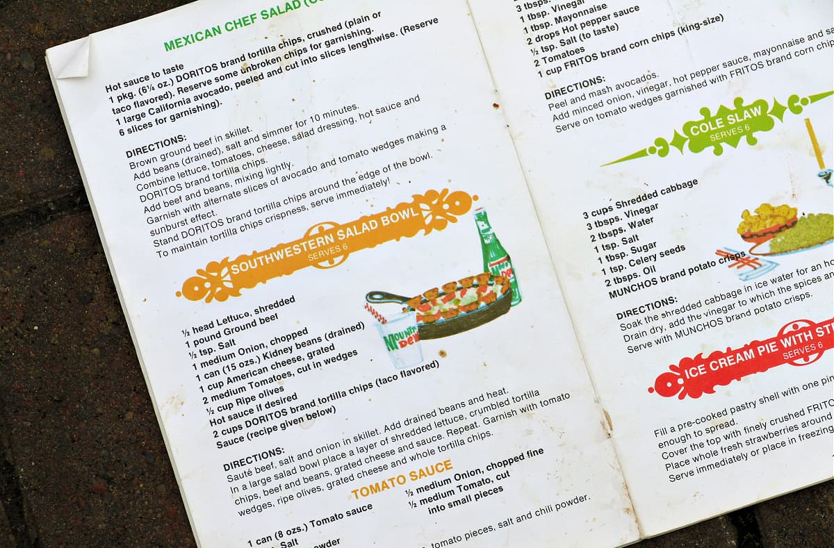 Close-up of page in recipe booklet on which Southwestern Salad Bowl recipe is printed, listing original ingredients.