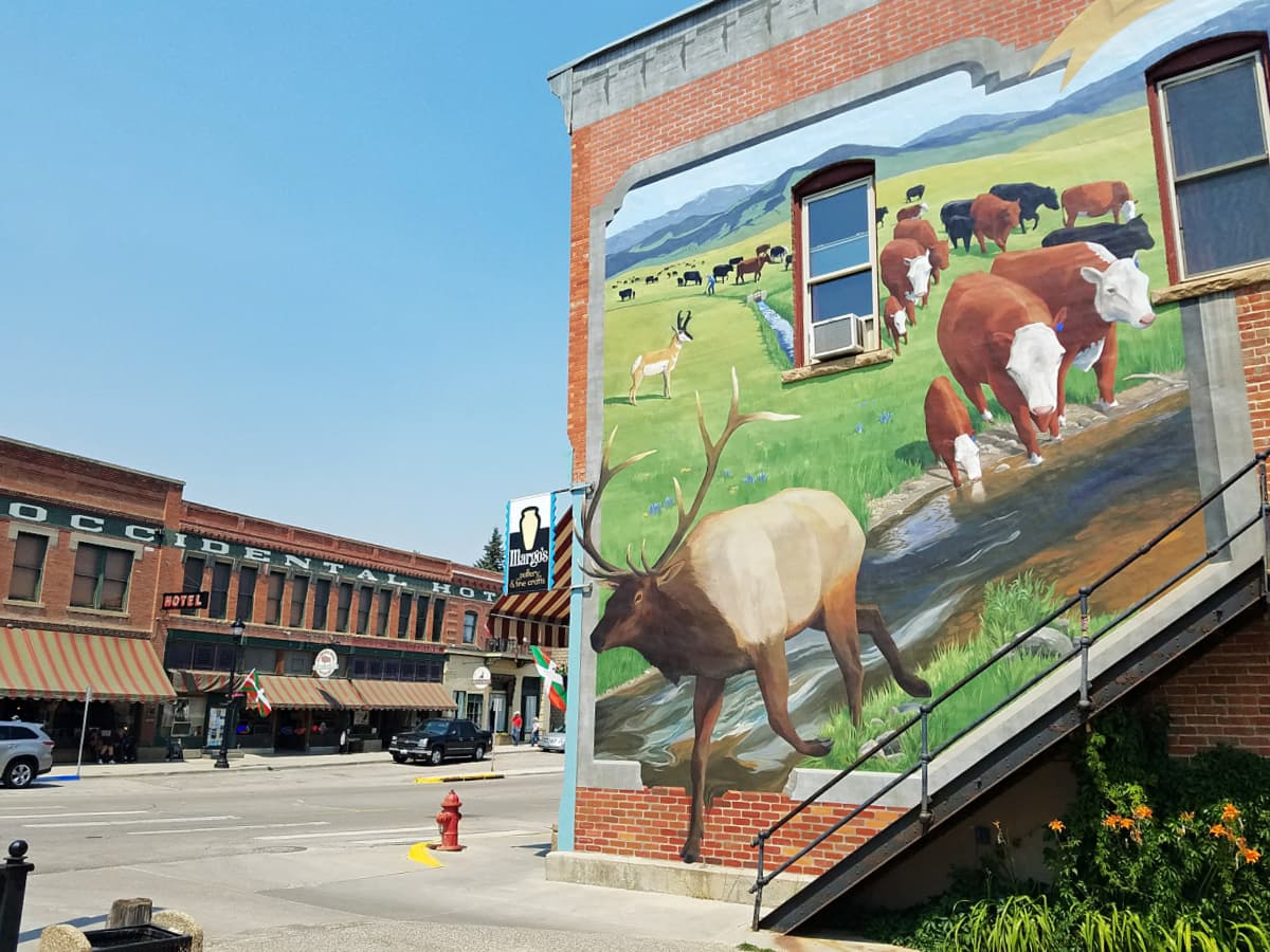 Mural of livestock and wildlife across the street from the Occidental Hotel. Buffalo, Wyoming. 