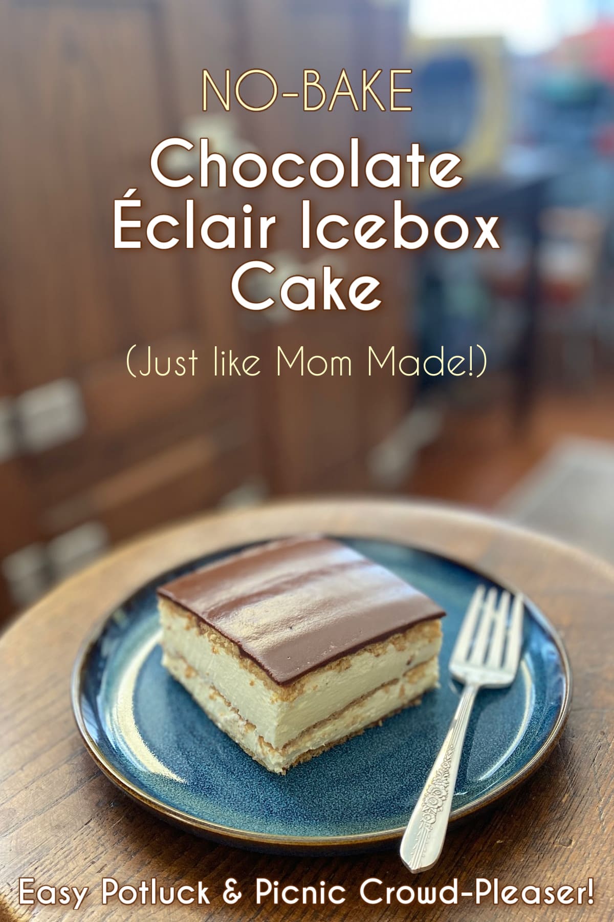 A chilled slice of no-bake chocolate éclair cake resting on a blue plate beside a dessert fork, highlighting the creamy vanilla and chocolate layers. Pin text reads "No-bake Choclate Eclair Icebox Cake (Just like Mom Made!) Easy Picnic & Potluck Crowd-Pleaser"
