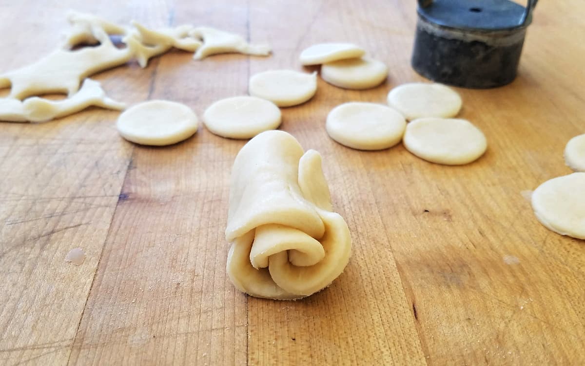 Pie dough rose in progress, rolled but not yet cut in half.