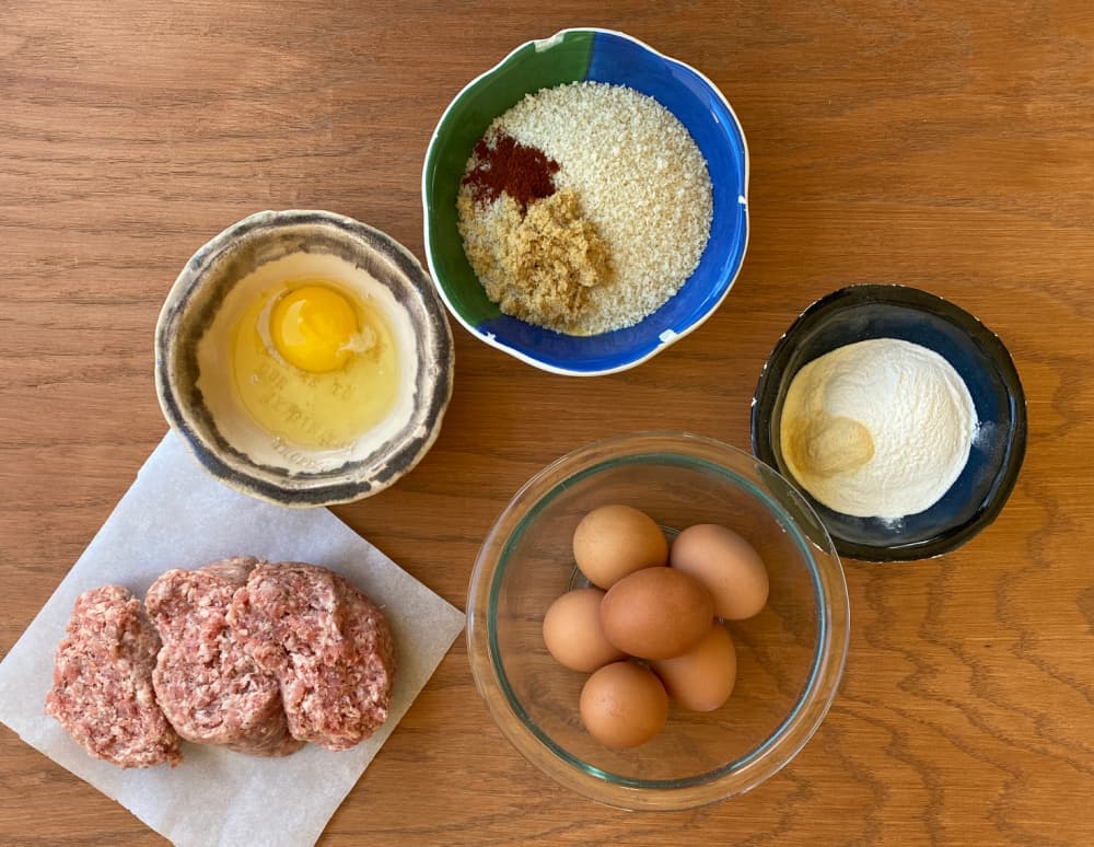 Scotch Eggs Ingredients: sausage, egg, soft-boiled eggs, Wondra, panko, seasonings. 