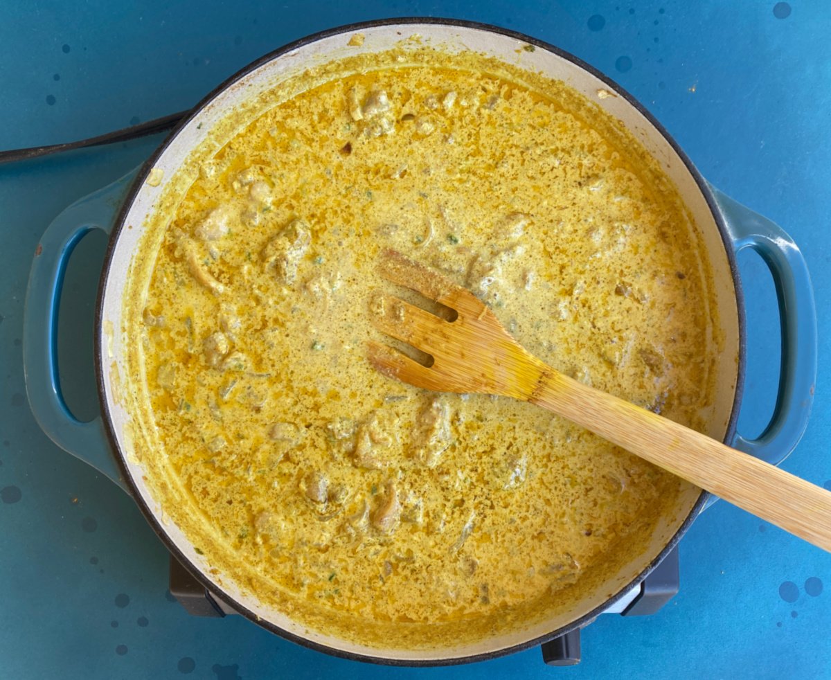Creamy curry sauce in a skillet. 