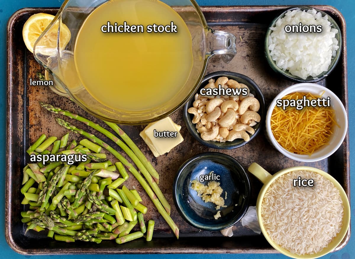 cashew asparagus pilaf ingredients: chicken stock, cashews, onions, spaghetti noodles, rice, asparagus, lemon, butter. 