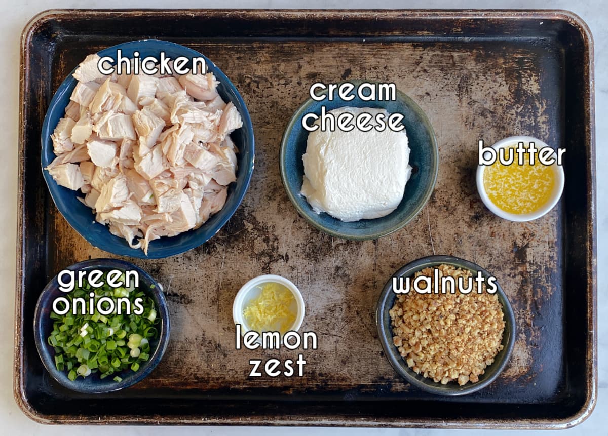 Chicken pillow ingredients, labeled: chicken, cream cheese, butter, lemon zest, green onions, walnuts.